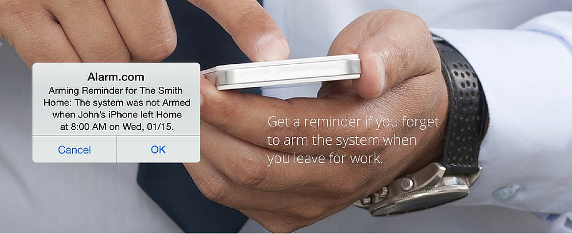 Man reviewing advanced protection alert on mobile phone